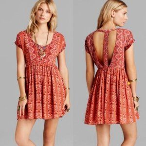 Free People Sundown orange printed babydoll dress size small.